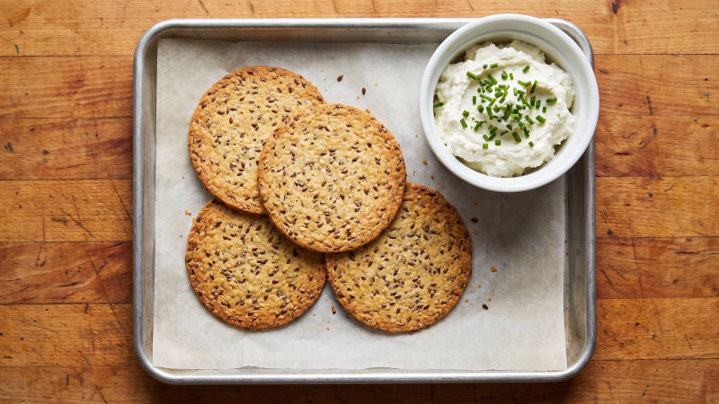 Flaxseed crackers with chive ricotta
